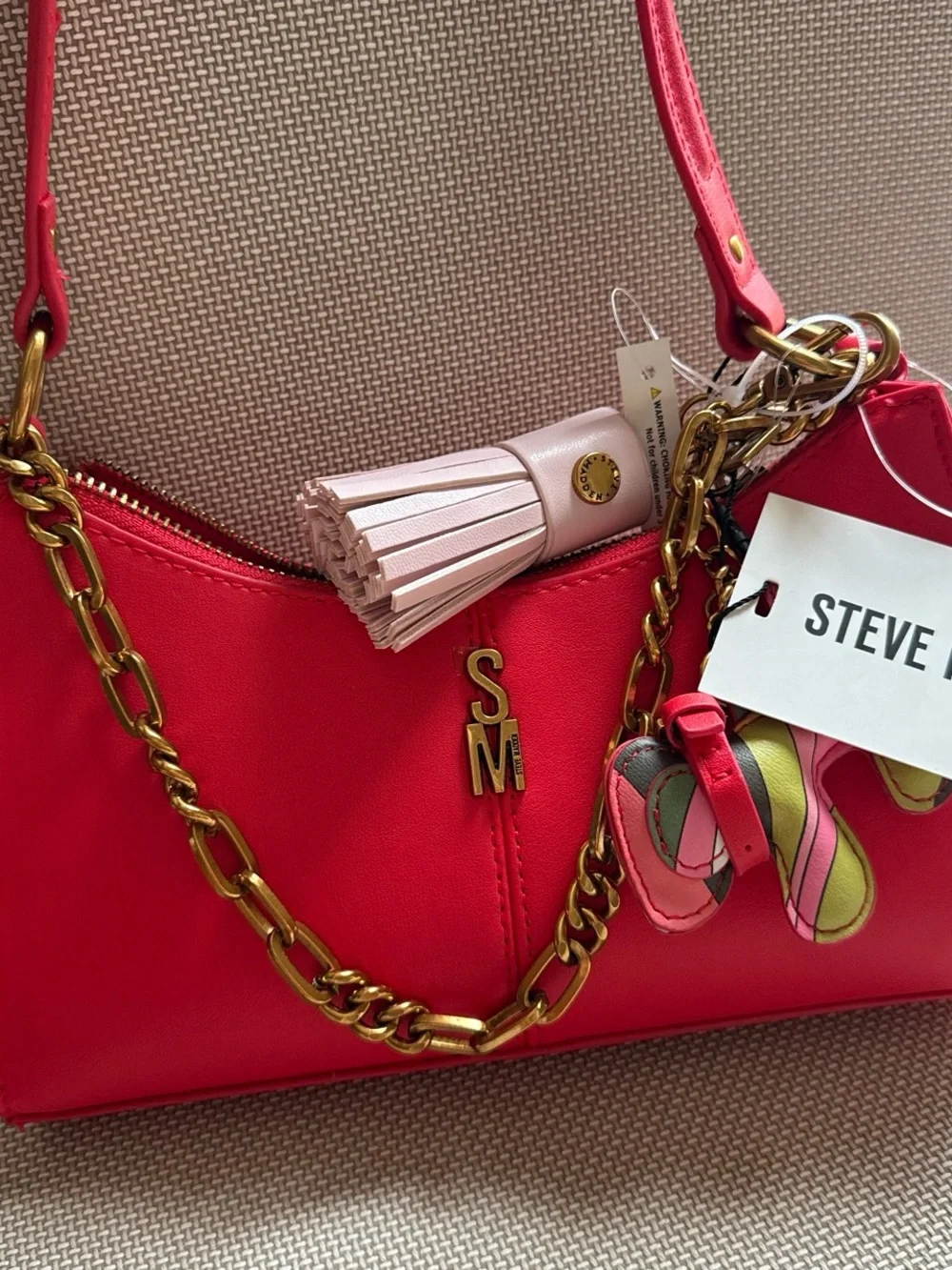 Steve Madden Coral-Red Shoulder Bag with Gold Chain & Tassel Charm